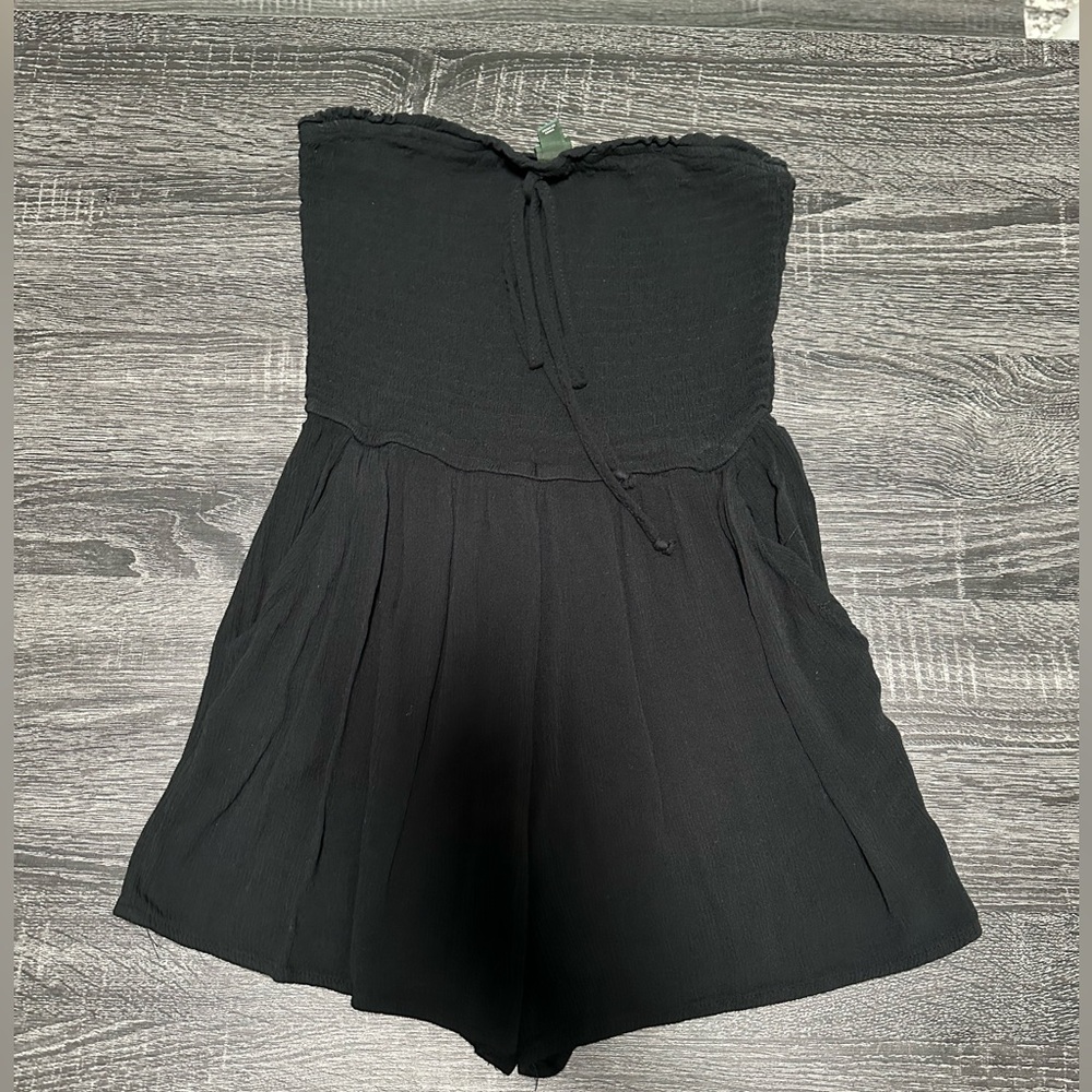 romper with smocked top, flowy bottom, & versatile straps